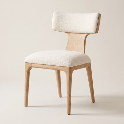 Cream boucle wingback dining chair with oak frame