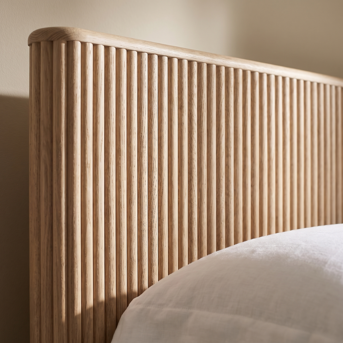 Close detail of the fluted oak headboard