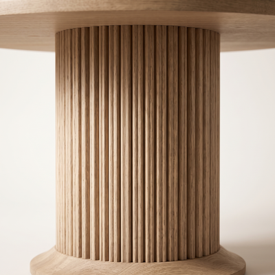 Close detail of the fluted oak pedestal base