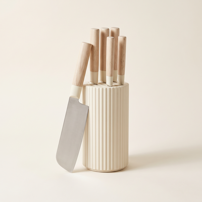 Six-piece knife set in a fluted cream block