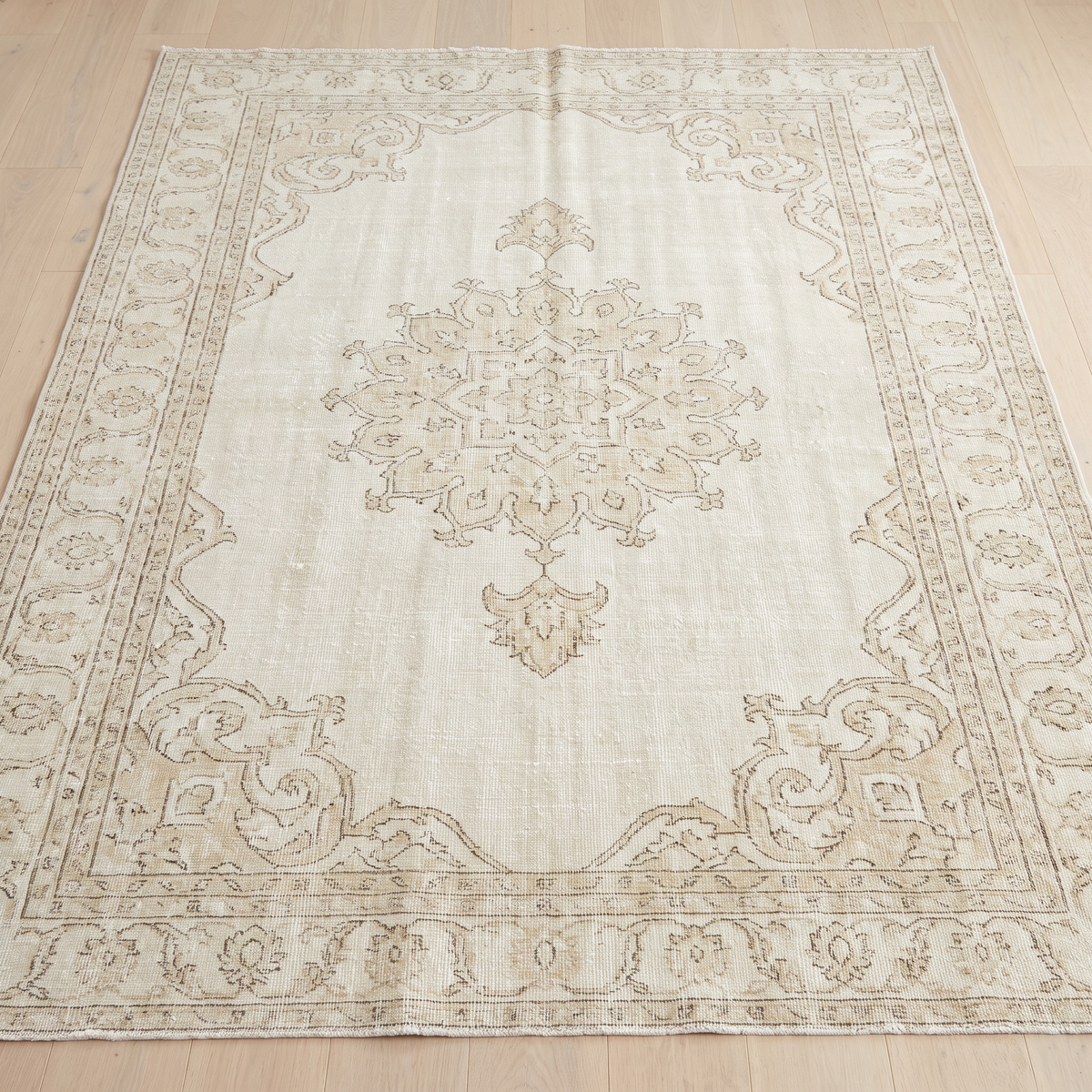 Ivory distressed vintage-style area rug