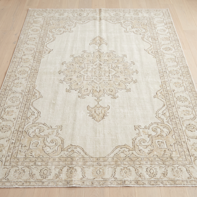 Ivory distressed vintage-style area rug