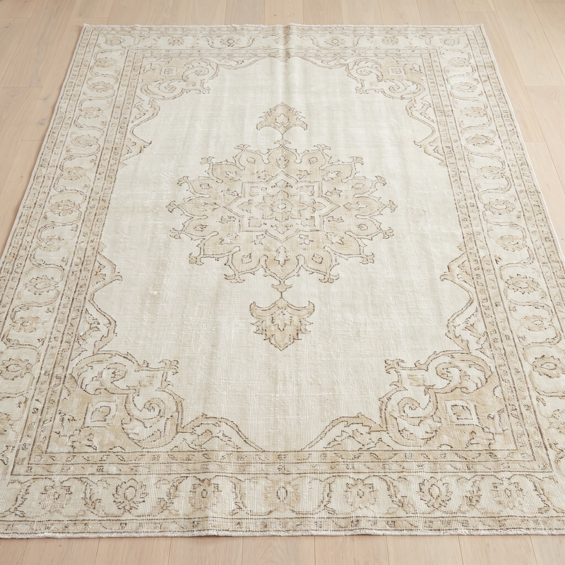 Ivory distressed vintage-style area rug