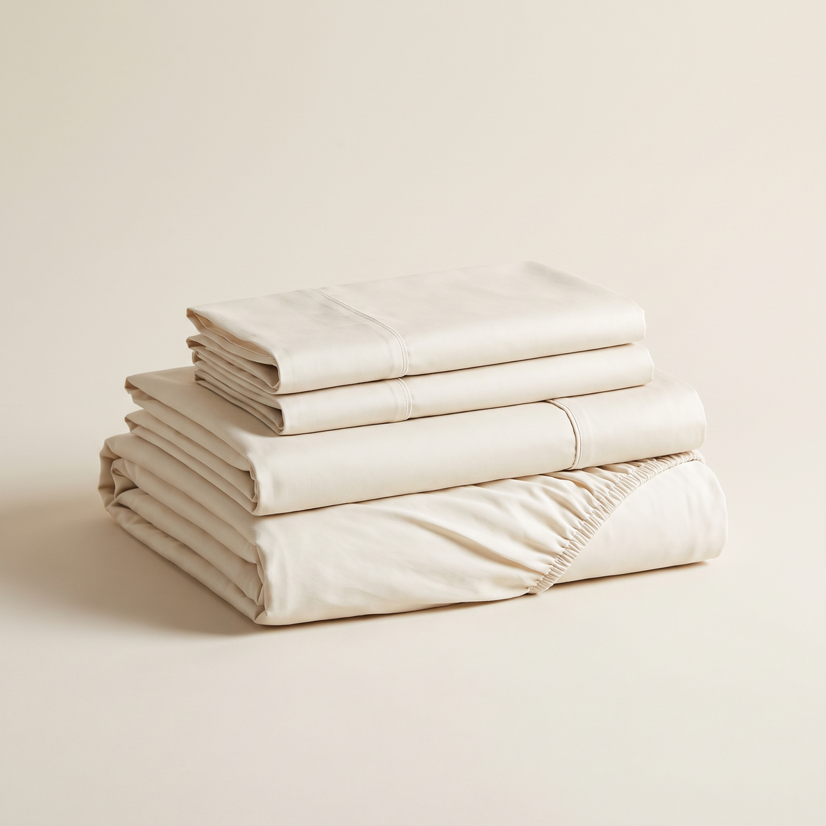 Bone white washed sateen sheet set, folded