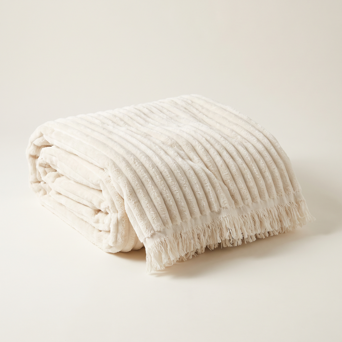 Ivory ribbed fleece blanket, folded