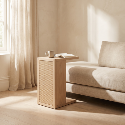 Sisal scratcher side table beside a linen sofa