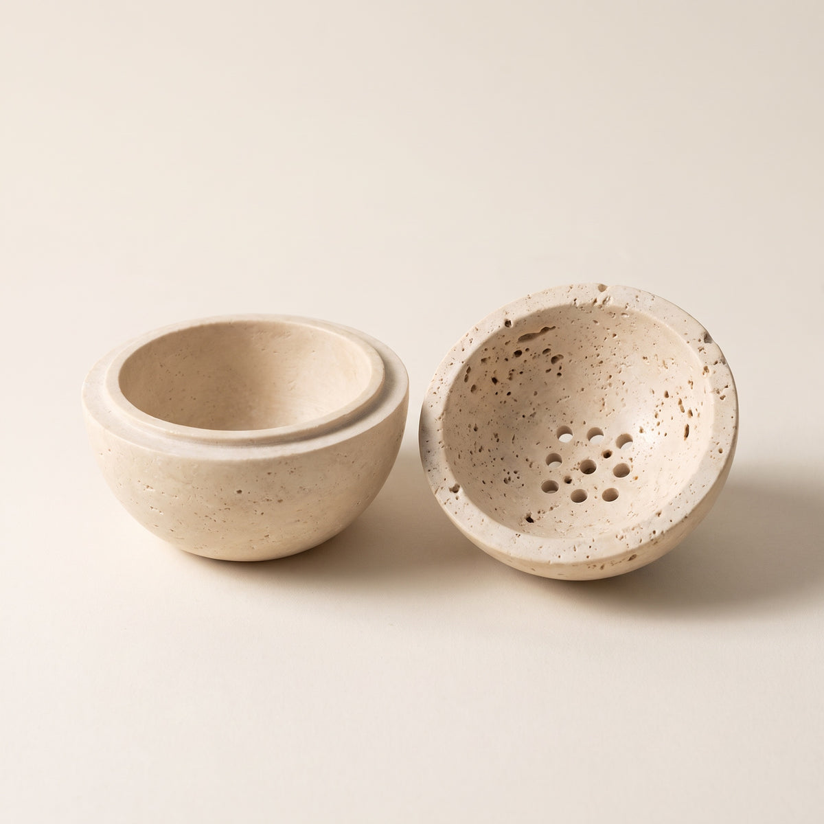 Both halves apart — the hollow well and the drilled dome