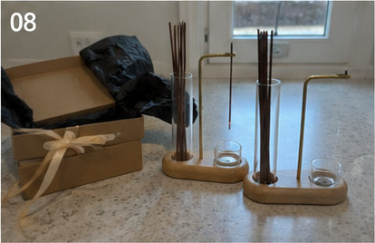 Two Kodo Burners on a counter with kraft gift boxes